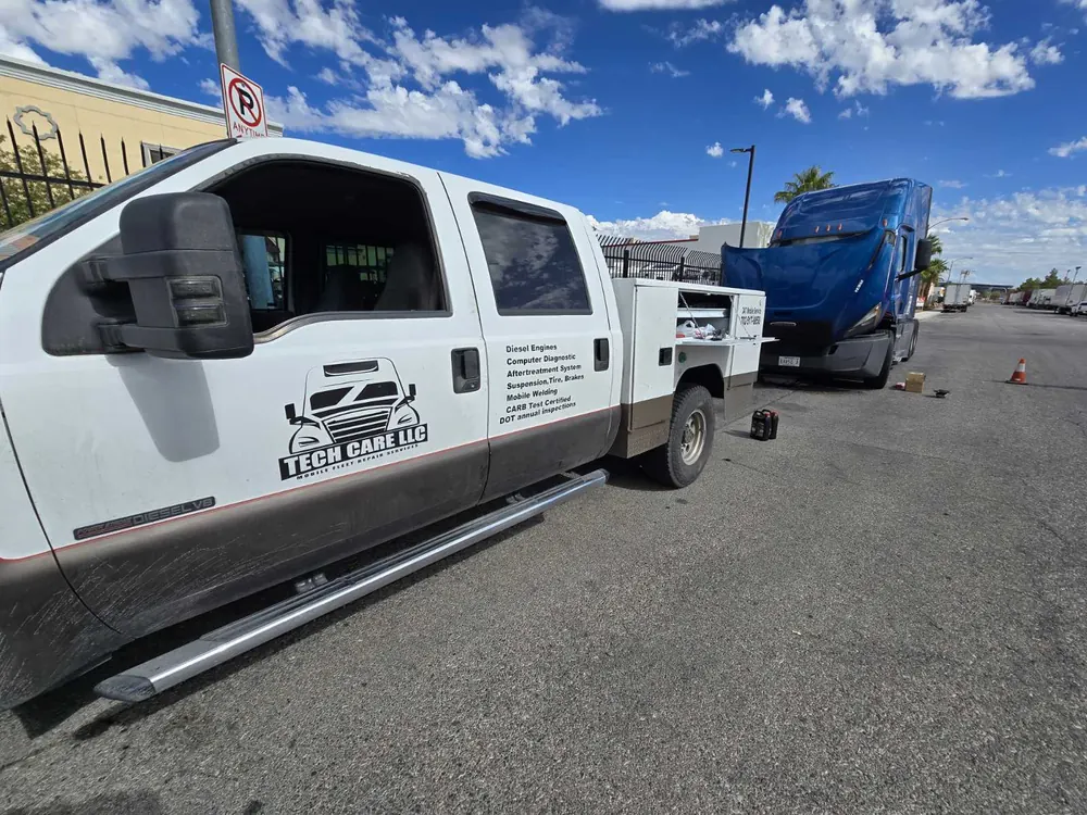 Tech Care service truck at a blue semi